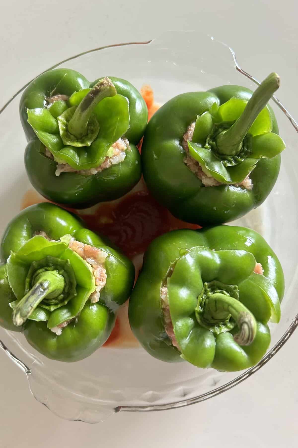 Put the tops on top of the stuffed peppers