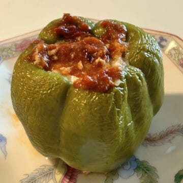 Baked stuffed peppers in a beautiful Chinese dish