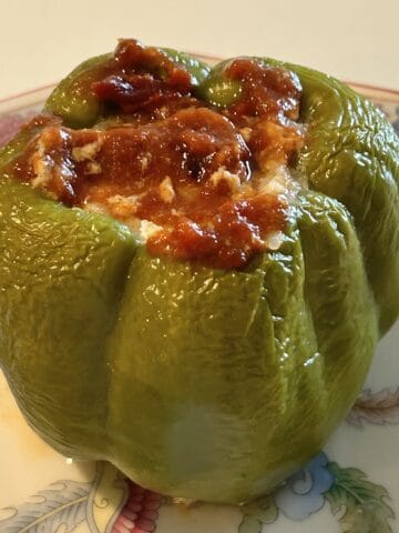 Baked stuffed peppers in a beautiful Chinese dish