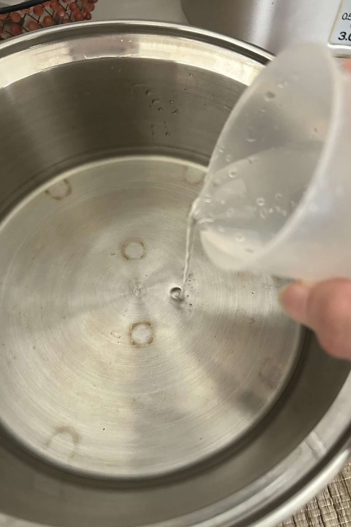 Add two cups of water to the Tatung rice cooker