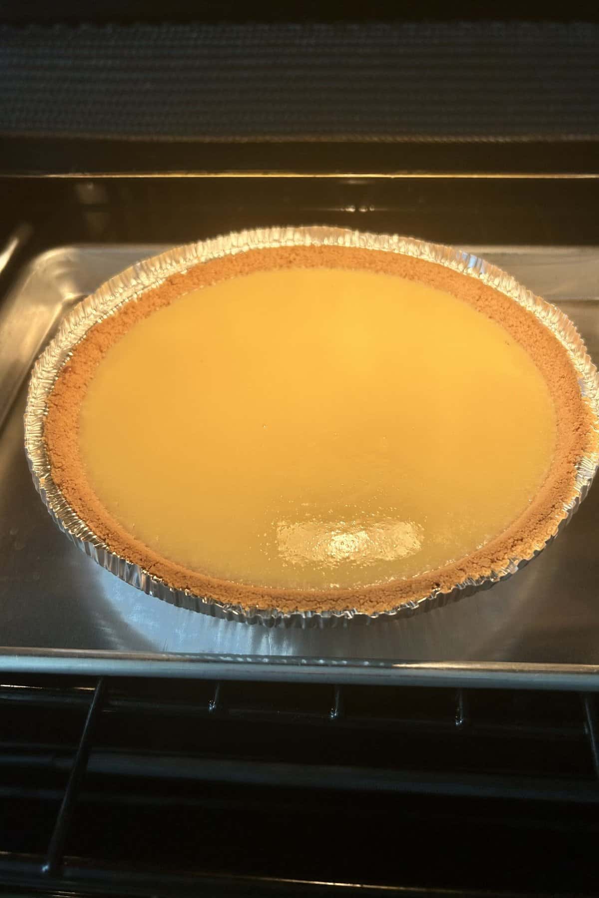 Baked key lime pie still in the oven