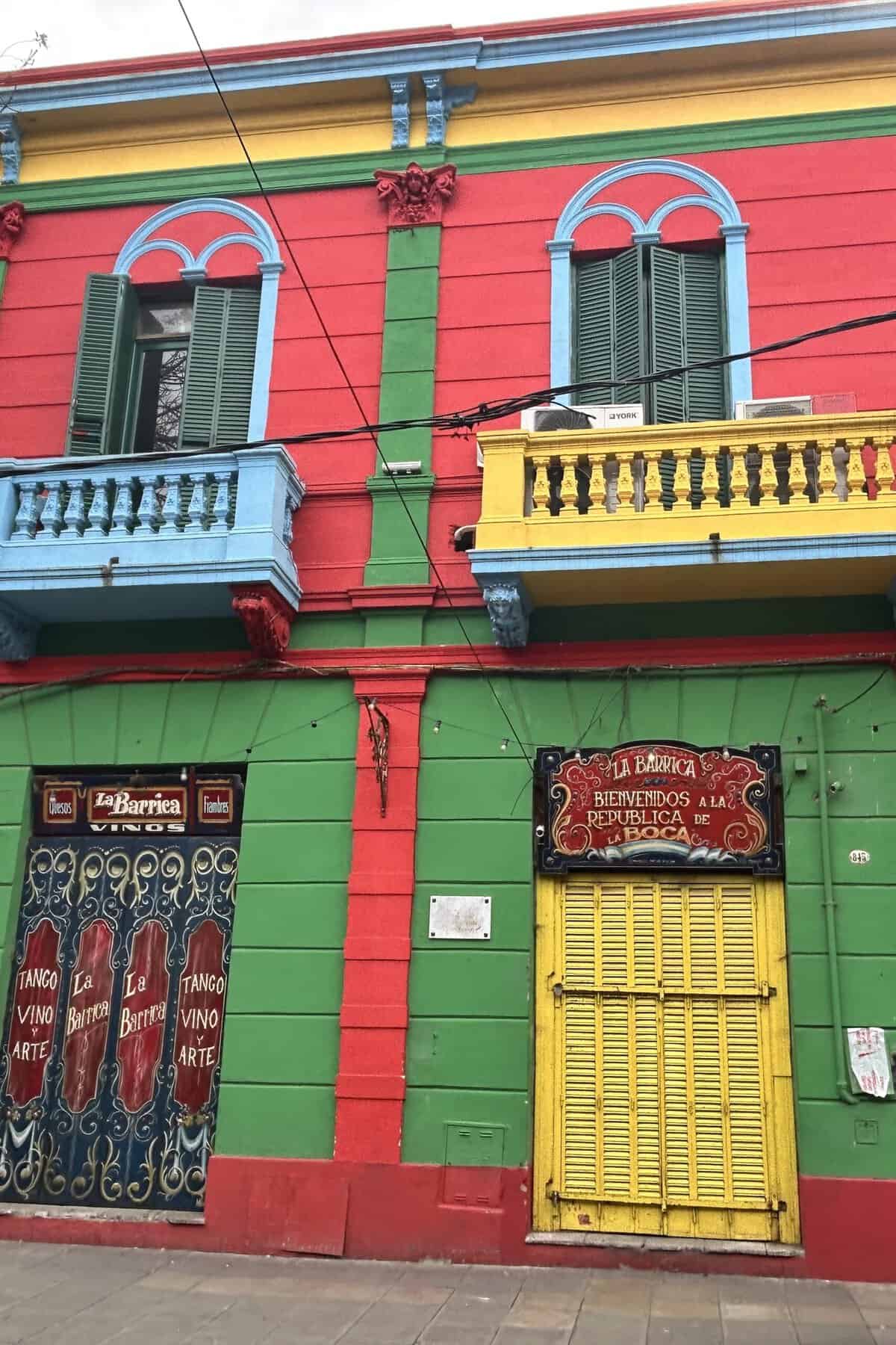 Green, red, yellow walls and doors in Caminito