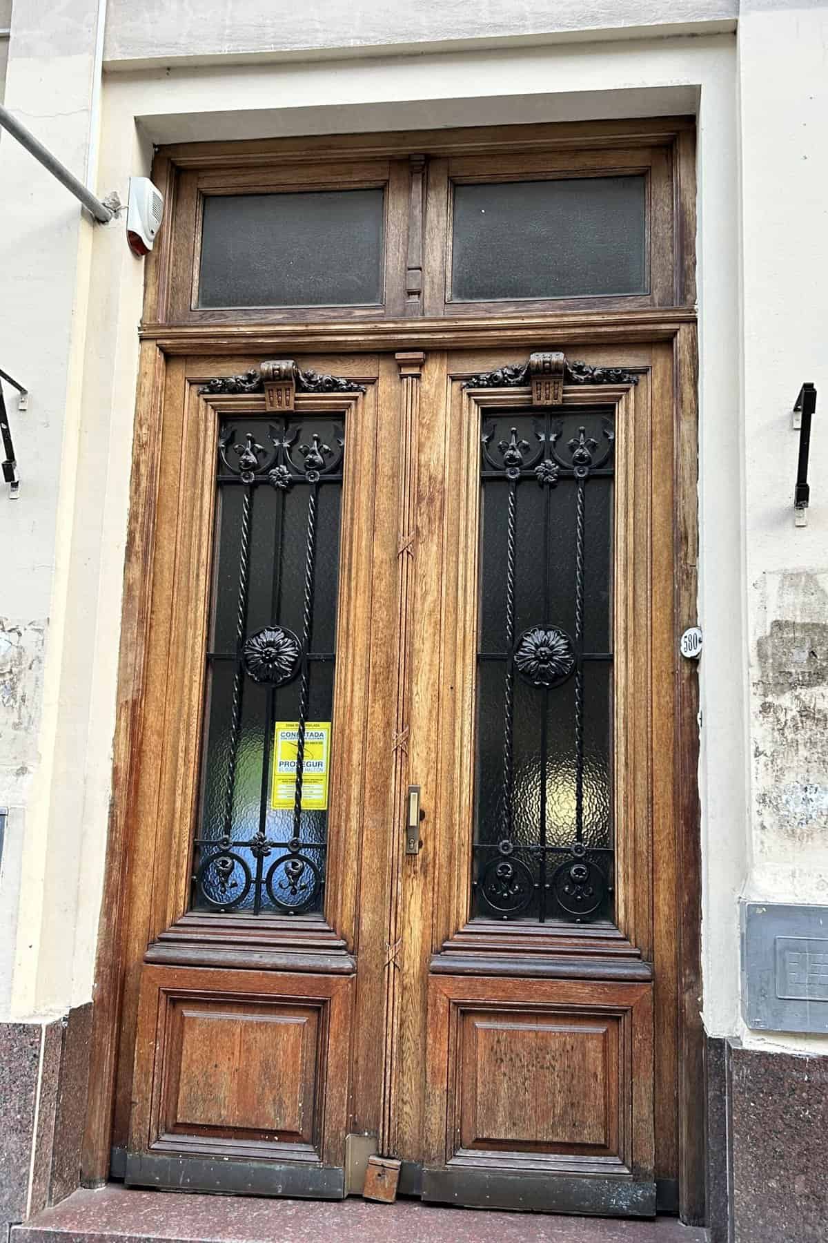 An old wood door with iron works in San Telmo