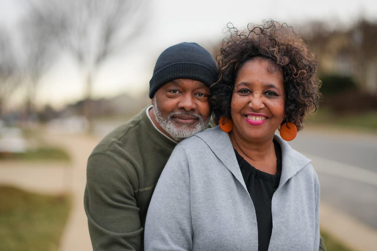 A couple smiling looks happy